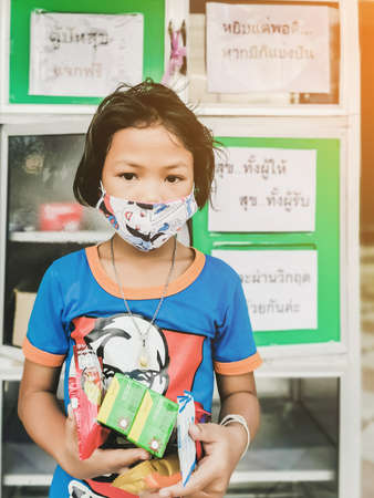 KANCHANABURI, THAILAND-MAY 15,2020: "THE PANTRY OF SHARING" Donation food pantry box or cupboard donate due to Coronavirus (COVID-19) crisis,Sharing campaign for Thai people at Tha Muang district.のeditorial素材