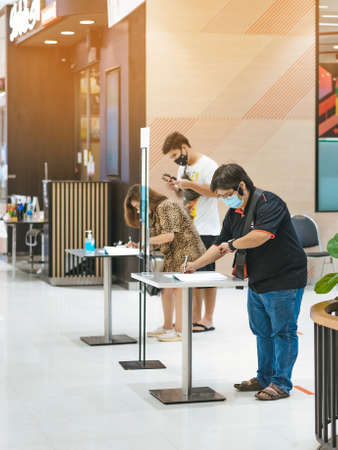 KANCHANABURI, THAILAND-MAY 19,2020: All people must register their identity using a QR code or registration book before shopping to prevent the spread of Corona virus(Covid-19) at Robinsonのeditorial素材