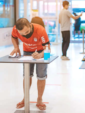 KANCHANABURI, THAILAND-MAY 19,2020: All people must register their identity using a QR code or...