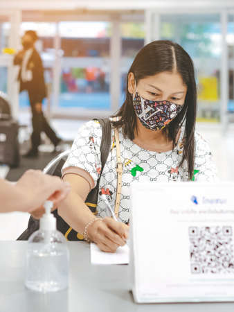 KANCHANABURI, THAILAND-MAY 19,2020: All people must register their identity using a QR code or registration book before shopping to prevent the spread of Corona virus(Covid-19) at Robinsonのeditorial素材