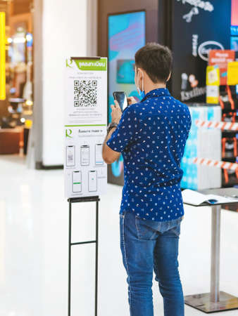 KANCHANABURI, THAILAND-MAY 19,2020: All people must register their identity using a QR code or registration book before shopping to prevent the spread of Corona virus(Covid-19) at Robinsonのeditorial素材