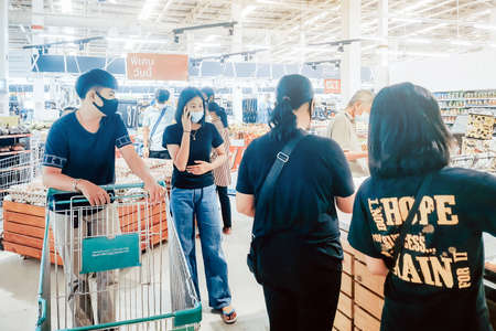 KANCHANABURI, THAILAND - MAY 6,2020: Unidentified Customer wearing face mask protection in...