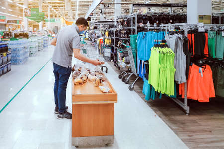 KANCHANABURI, THAILAND - MAY 6,2020: Unidentified Customer wearing face mask protection in prevention for Corona Virus (Covid -2019) and shopping at Lotus Supermarket on May 6,2020のeditorial素材