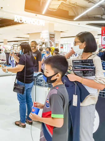 KANCHANABURI, THAILAND - MAY 30,2020: Unidentified Customers wearing face mask protection in prevention for Corona Virus (Covid -2019) and shopping at Robinson department store on May 30,2020のeditorial素材