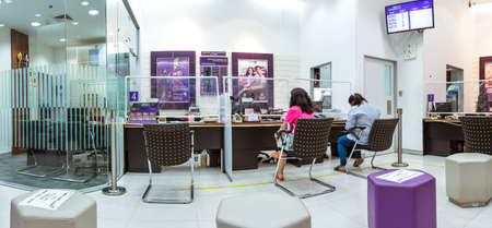 KANCHANABURI THAILAND-APRIL 28,2020: Panoramic view of transactions with the bank during the spread of the Corona virus(Covid-19) at Siam Commercial Bank on April 28,2020 in Kanchanaburi,Thailand.のeditorial素材