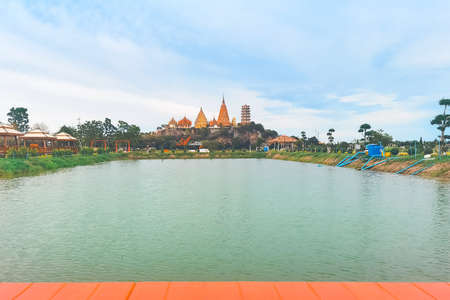 KANCHANABURI THAILAND - JUNE 26: A beautiful view of the cafe and the newly created food with the famous Wat Tham Sua Temple in the  background at Ananda coffee and restaurant on June 26,2020のeditorial素材