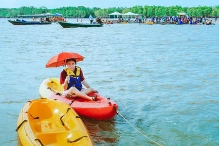 CHANTHABURI, THAILAND: APRIL 15, 2019 Unidentified Tourists travel by raft boats to relax and kayaking on april 15,2019 at Bang Chan (The No-Land Village), Chanthaburi, Thailandのeditorial素材
