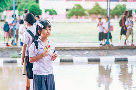 LAMPHUN THAILAND - DECEMBER 9 :  Unidentified tourists taking pictures and selfies while the sunrise on December 9,2019 at Wat Phra Phutthabat Pha Nam in Lamphun, Thailandのeditorial素材