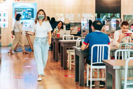 KANCHANABURI, THAILAND-JULY 11,2020:All customers must check the temperature and wash their hands with alcohol gel before shopping to prevent Coronavirus (Covid-19) at Robinson Department Storeのeditorial素材