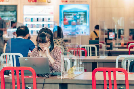 KANCHANABURI, THAILAND-MAY 19,2020: All people must register their identity using a QR code or...