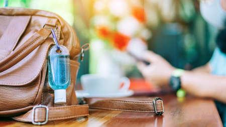 Back view portrait of a Asian elderly man in fitness wear walking and jogging for good health in public park. Senior jogger in nature.  Older Man enjoying Peaceful nature. Healthcare concept.の写真素材