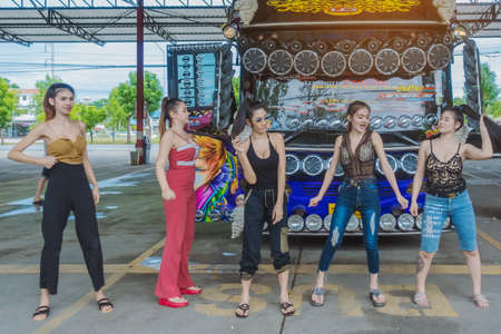 KANCHANABURI/THAILAND - AUGUST 9, 2020: Unidentified people choose to buy a fabric mask to prevent the Corona Virus (Covid-19) in vending machine in front of the entrance to Robinson Department Store.のeditorial素材
