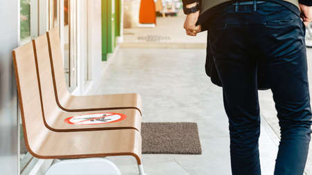 Alternative seating mark for social distance rules in front of the bank distance for one seat from...