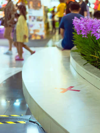 Protective corrugated plastic sheets screen partition from each other for social distancing to prevent Corona Virus (Covid 19) outbreak on the table at restaurant.Social distance.New normal lifestyleの写真素材