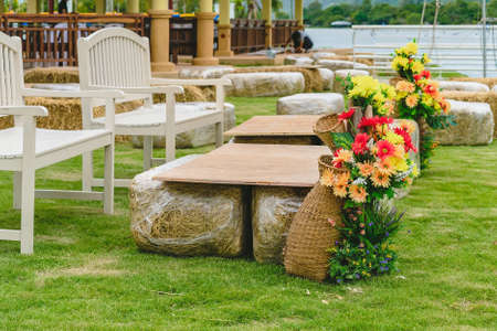 Close up to barista make coffee with Vacuum Pot Syphon Brewer.  Syphon (Siphon) coffee maker brews drink using two chambers where vapor pressure and vacuum produce coffee in cafe. Selective focus.の写真素材