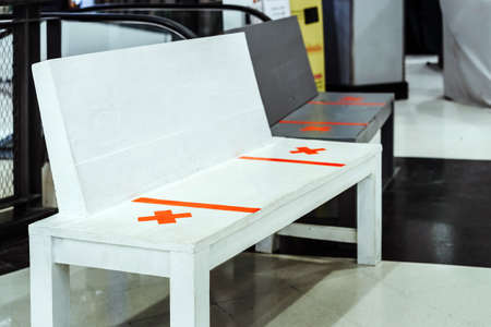 Alternative seating mark for social distance rules in the mall distance for one seat from other people to protect from  Virus , social distancing for infection risk.New normal lifestyleの写真素材