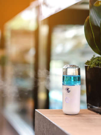 Alcohol nano mist sprayer for hand cleaning to prevent the spread of the virus    to serve customers...