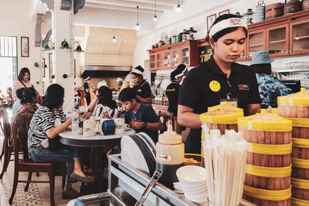 NAKHON SI THAMMARAT,THAILAND-AUGUST 30,2020 : Atmosphere inside the Copee Kafaboran restaurant. It is a famous old Chinese and coffee restaurant which is popular with tourists and locals.のeditorial素材