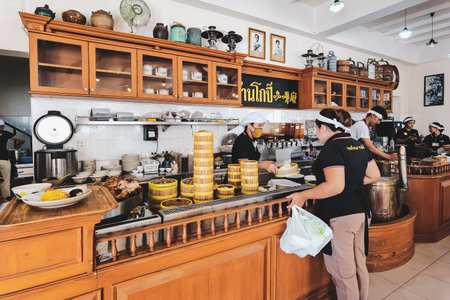 NAKHON SI THAMMARAT,THAILAND-AUGUST 30,2020 : Atmosphere inside the Copee Kafaboran restaurant. It is a famous old Chinese and coffee restaurant which is popular with tourists and locals.のeditorial素材