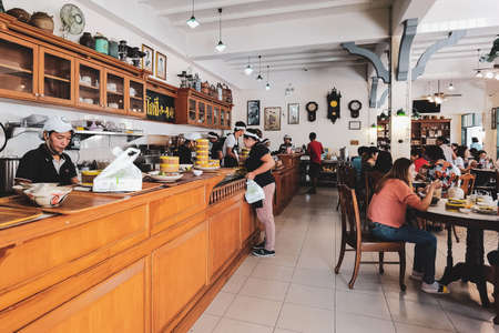 NAKHON SI THAMMARAT,THAILAND-AUGUST 30,2020 : Atmosphere inside the Copee Kafaboran restaurant. It is a famous old Chinese and coffee restaurant which is popular with tourists and locals.のeditorial素材