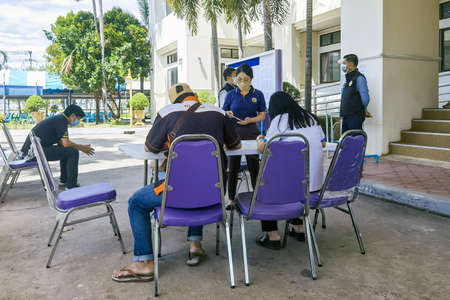 KANCHANABURI, THAILAND-AUGUST 25,2021 : Unidentified people wait in a queue to take first dose of...