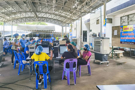 KANCHANABURI, THAILAND-AUGUST 25,2021 : Unidentified people wait in a queue to take first dose of...