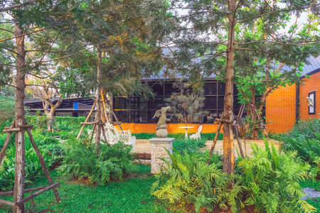 KANCHANABURI,THAILAND - FEBRUARY 14, 2021 : Beautiful garden decoration of Cafe Amazon coffee shop...