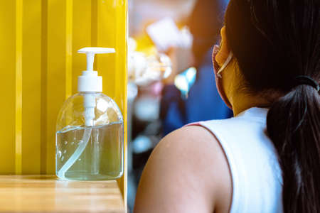 Blue alcohol gel bottle for hand cleaning to prevent the spreading of the Corona virus...