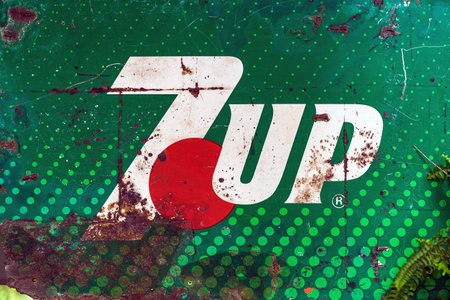 KANCHANABURI, THAILAND-DECEMBER 29,2019 : Close up vintage 7 UP logo banner, old rusty and broken...