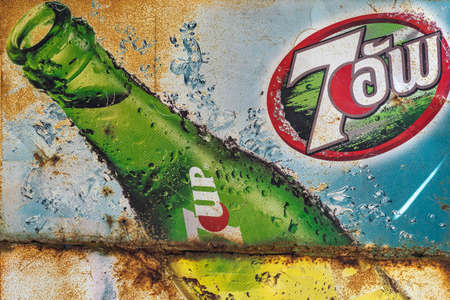 KANCHANABURI, THAILAND-DECEMBER 29,2019 : Close up vintage 7 UP logo banner, old rusty and broken...