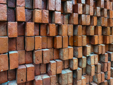 Brown brick wall. Texture of brown brick wall pattern background. Abstract wallpaper texture with old and vintage style pattern. Home or office design backdrop. Outstandingly beautiful architecture.の写真素材