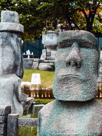 RATCHABURI, THAILAND-MAY 12, 2019 : Beautiful Moai imitation of the real statue simulates a roadside...