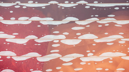 Close up to rear window of car with bubbles on glass very poor substandard tint. Bubbles when...