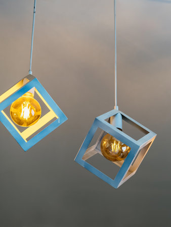 Deteriorated bulb give the dimmed light much darker than normal bulbs on the lamps hanging from...