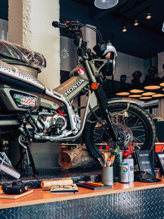 NAKHON PATHOM,THAILAND-JANUARY 7, 2023 : View of Honda Super Cub C 125 Motorcycle classic 125cc. collection on display for sale at CUB House Nakhon Pathom Honda x Greyhound Coffee. Concept retro.のeditorial素材