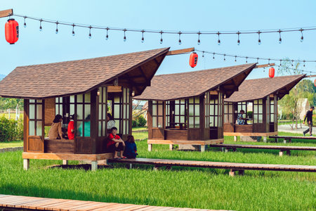 KANCHANABURI-THAILAND,MARCH 30, 2023 : Beautiful landscape in Japanese architectural style resting in the midst of verdant rice fields outdoors at Tomi Edo Park. Beautiful Outdoor Restaurant and cafe