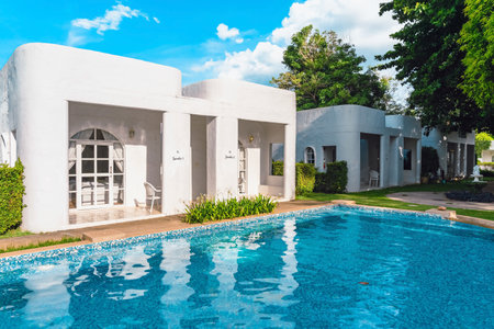 KANCHANABURI-THAILAND,JUNE 30,2023 : Beautiful exterior view of modern resort in loft style or decoration of cozy lodge in modern style at Villa La Flora. Beautiful Resort or Hotel exterior in garden.のeditorial素材