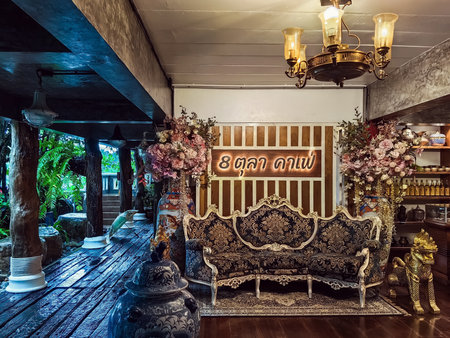 NAKHON SI THAMMARAT, THAILAND - NOVEMBER 26,2023 : The interior of cafe decorated with beautiful antique collectibles and comfortable seats perfect for relaxing with delicious coffee at 8 OCT. CAFE.のeditorial素材