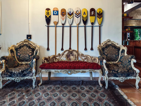 NAKHON SI THAMMARAT, THAILAND - NOVEMBER 26,2023 : The interior of cafe decorated with beautiful antique collectibles and comfortable seats perfect for relaxing with delicious coffee at 8 OCT. CAFE.のeditorial素材