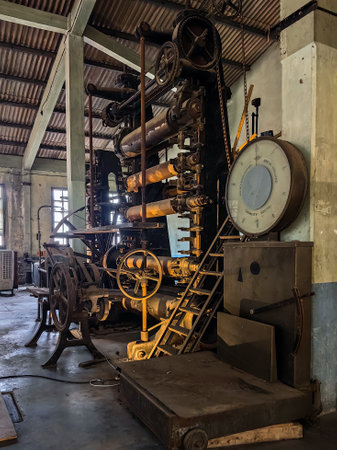 KANCHANABURI, THAILAND - FEBRUARY 2,2024 : Interior view of antique material, equipment, tools, and technology inside a former World War II era old paper mill (New Historic Landmark of Kanchanaburi).のeditorial素材