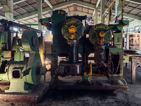KANCHANABURI, THAILAND - FEBRUARY 2,2024 : Interior view of antique material, equipment, tools, and technology inside a former World War II era old paper mill (New Historic Landmark of Kanchanaburi).のeditorial素材