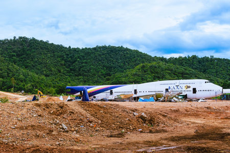 KANCHANABURI,THAILAND-SEPTEMBER 6,2024 : Construction of new cafe and restaurant using an old commercial airplane from Thai Airways to renovation for a new beautiful landmark surrounded by mountains.のeditorial素材