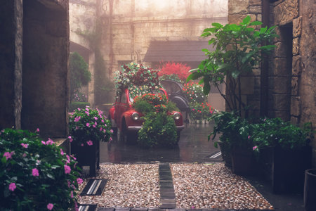 Fresh and beautiful colorful flowers with green leaves decorate with classic vintage car on rainy...
