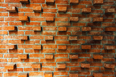 Background or backdrop of brown brick wall texture. Lattice brown brick wall background. Beautiful...