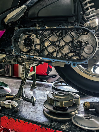 Change motorcycle engine belt. Motorcycle check and replace parts of scooter belt and dry clutch...