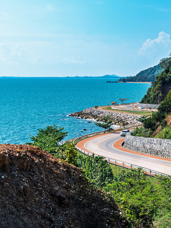 Beautiful seascape viewpoint of the winding road along sea. Viewpoint and beautiful landmark of Noen Nang Phaya at Kung Wiman Bay in Chanthaburi Thailand. Beautiful scenic coastal road sea landscape.の写真素材
