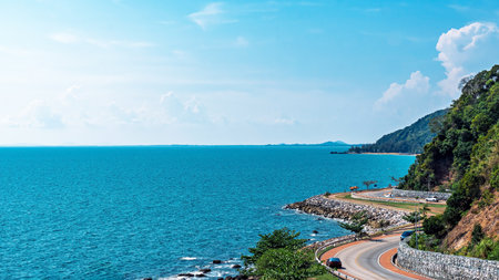 Beautiful seascape viewpoint of the winding road along sea. Viewpoint and beautiful landmark of Noen Nang Phaya at Kung Wiman Bay in Chanthaburi Thailand. Beautiful scenic coastal road sea landscape.の写真素材