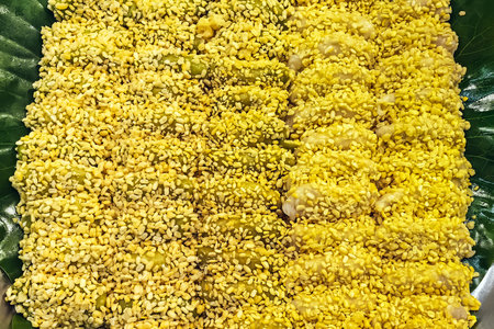 Soft mung bean crepe or Kanom Thuapaep. Mung bean rice crepe or Mung bean dumpling. Yellow bean rice crepe. Thai delicious dessert with peanut and soft flour with soybean sprinkle all over the doughの写真素材