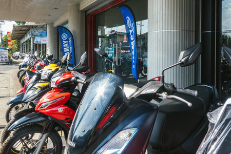 KANCHANABURI, THAILAND -JULY 15, 2019 : Special discounted beautiful new Yamaha motorcycles and accessories for sale at Lo Heng Mong Sales and Service. Motorcycles and scooter on display for sale.のeditorial素材