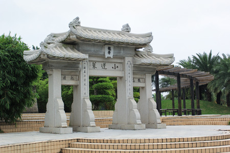 Xiamen, China - Aug 31, 2013: Ancient stone door in Xiamen Garden Expo, Chinaのeditorial素材